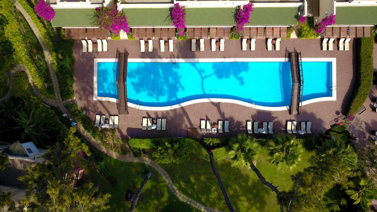 Turquoise Hotel Side Exterior foto